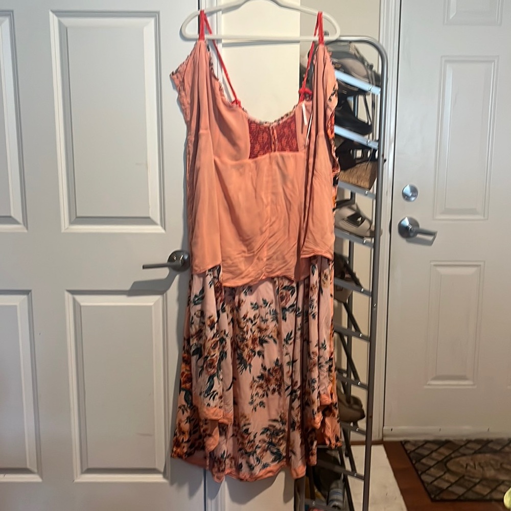 This gorgeous dress no longer fits me.